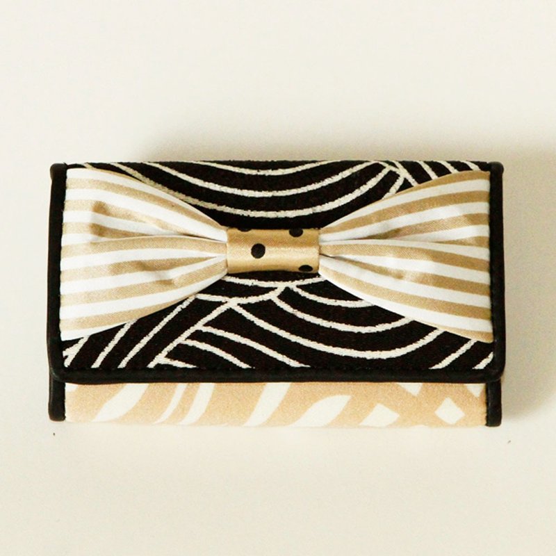 key holder wallet beige gold ribbon Assistant Director dots borders stripes