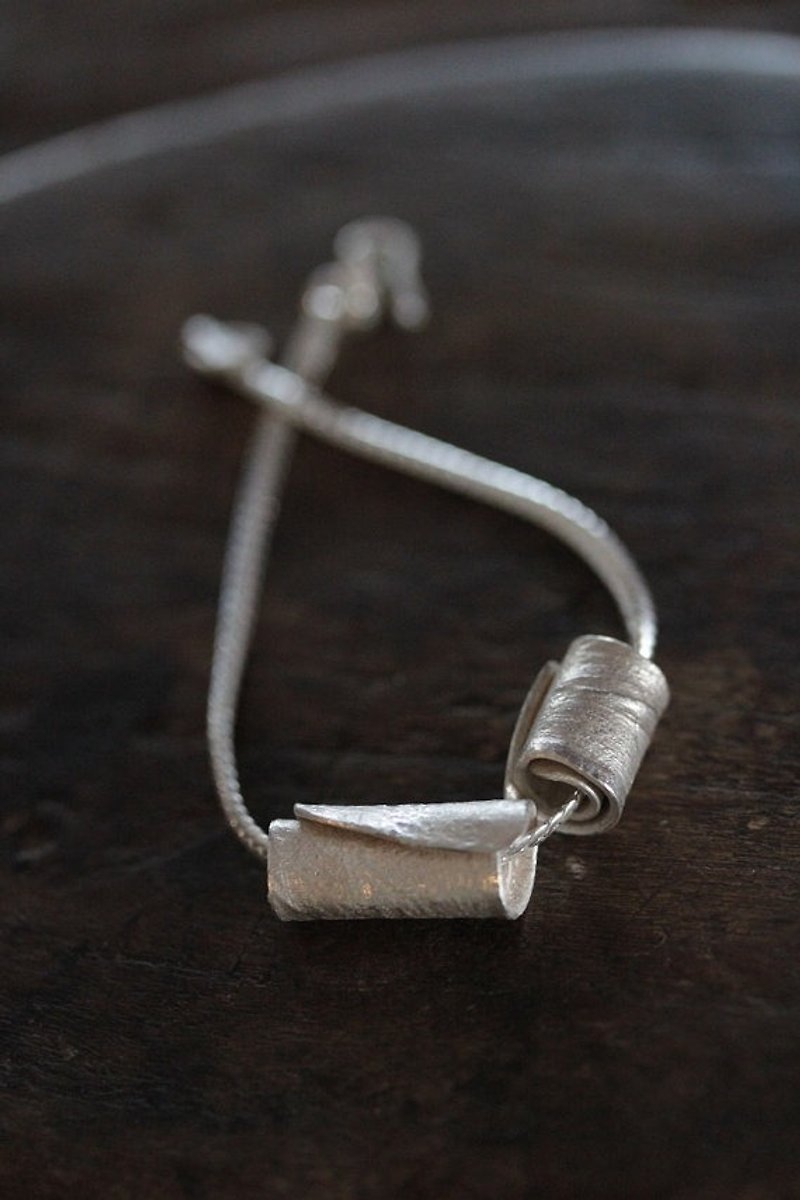 Silver bracelet with two handmade wrapped rolls with textured surface - 手链/手环 - 银 银色