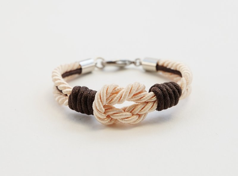 Cream tie the knot bracelet with dark brown waxed cotton cord - 手链/手环 - 纸 咖啡色