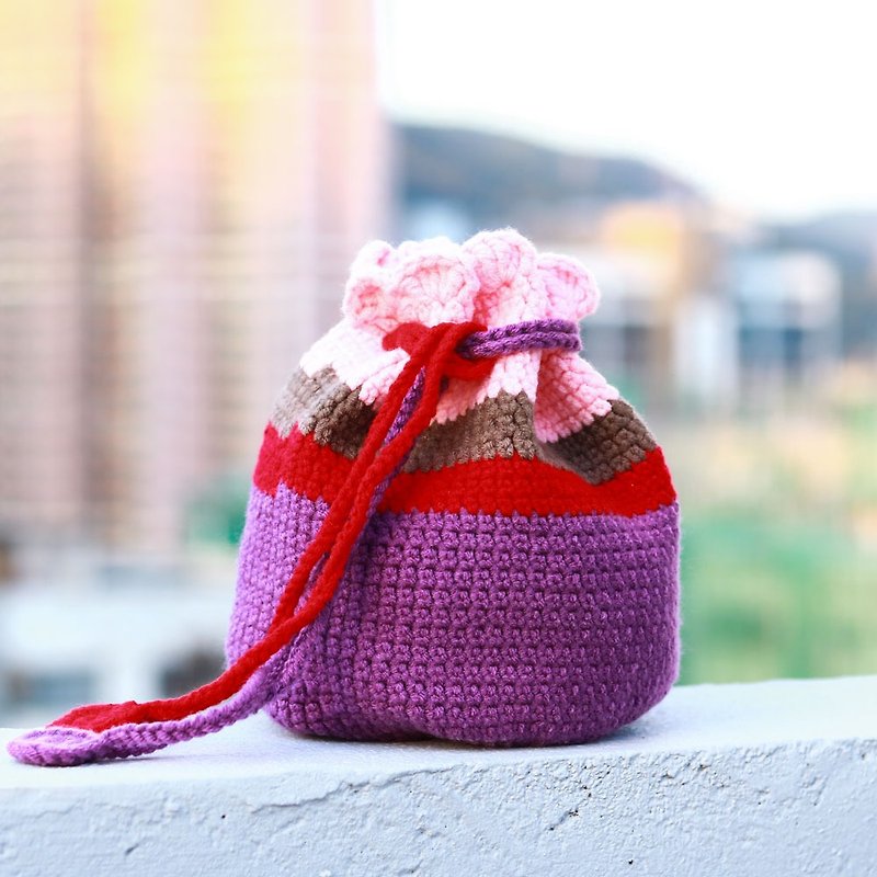 花样束口手提钩织编织包 - 紫粉花边
