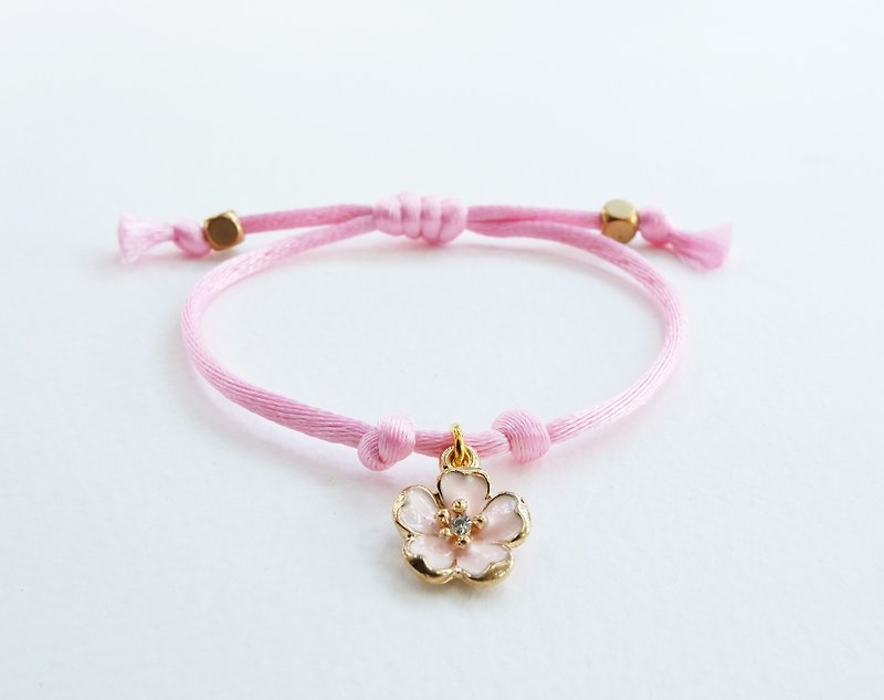 Pink silk rope bracelet with sakura pink charm - 手链/手环 - 其他材质 粉红色