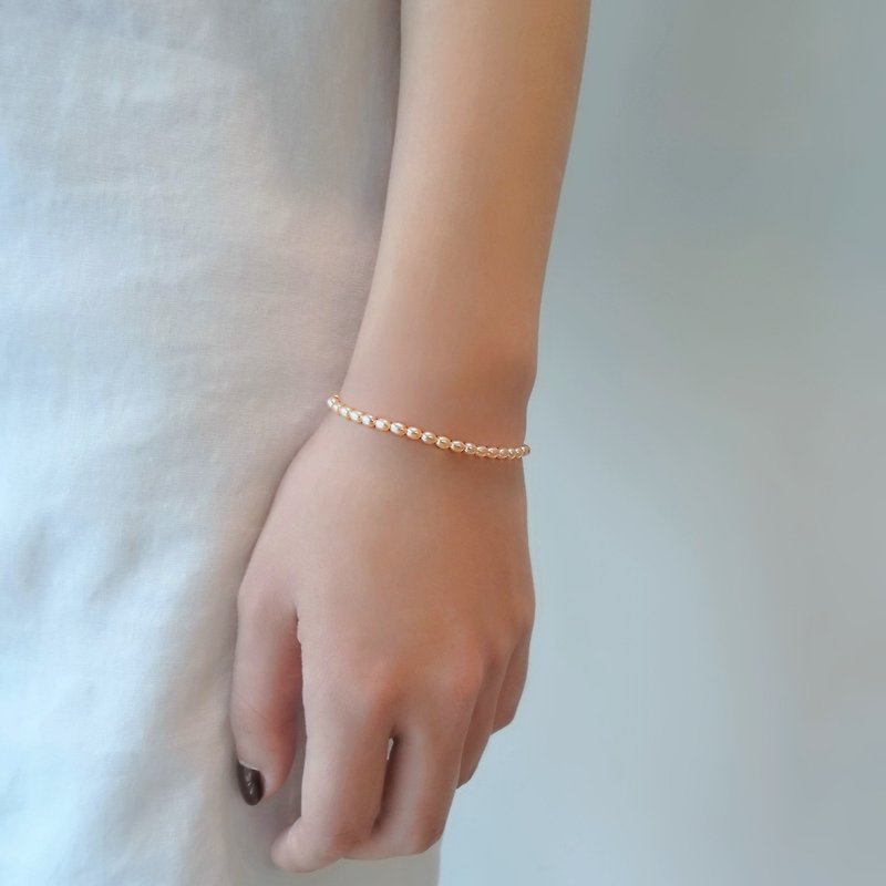 蜜桃粉橘 米粒淡水珍珠 14Kgf 包金 可调整手链 | 可改为纯银 - 手链/手环 - 珍珠 橘色
