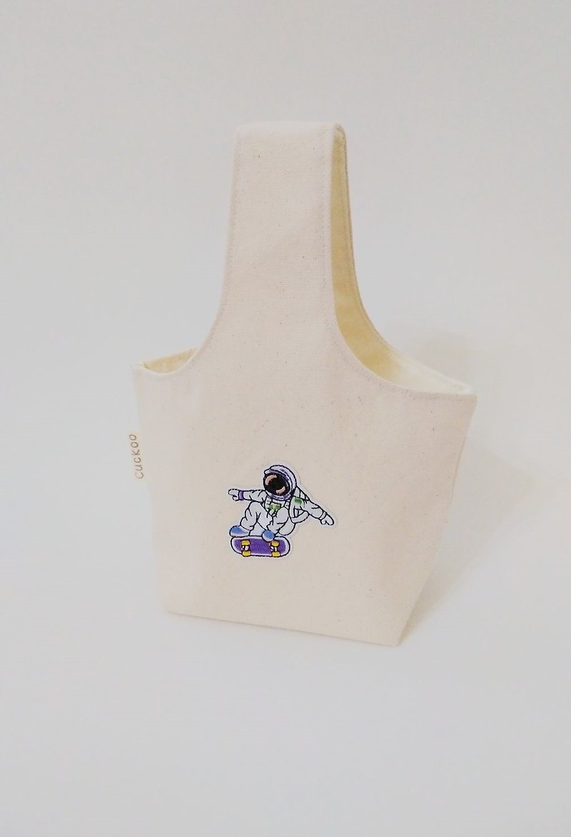 手提袋 挽袋 刺绣手提包 滑板上的太空人 (小款) - 手提包/手提袋 - 棉．麻 白色