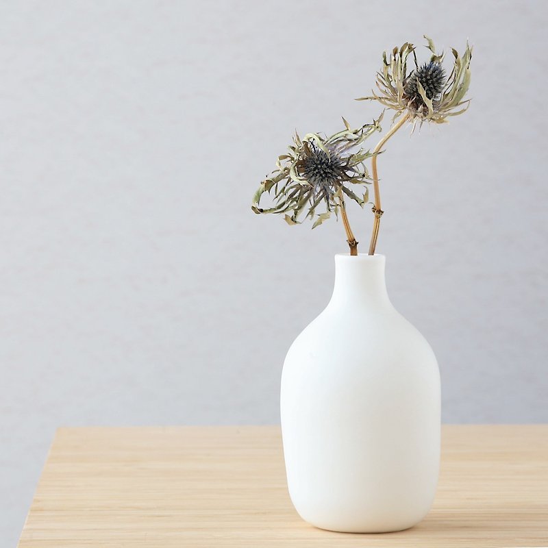 Long white pottery flower vase