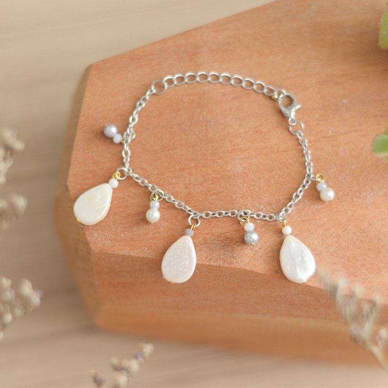 a beautiful handmade real white rain drop pearl bracelet by niyome craft